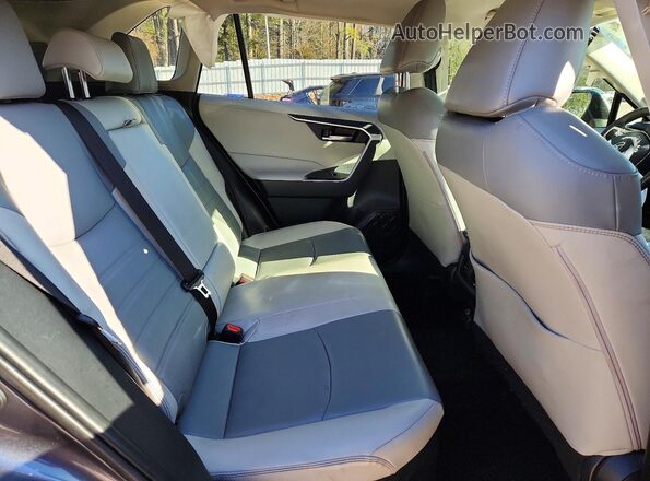 JTMB6RFV8MD039318 2021 TOYOTA RAV4 Gray Vista interior trasera