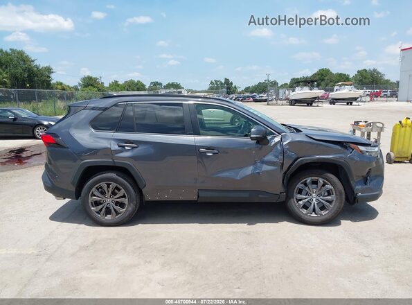 JTMB6RFV8PD100431 2023 TOYOTA RAV4 HYBRID Gray Widok wnętrza z tyłu