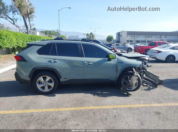 JTMB6RFV9MD041000 2021 TOYOTA RAV4 HYBRID Gray 