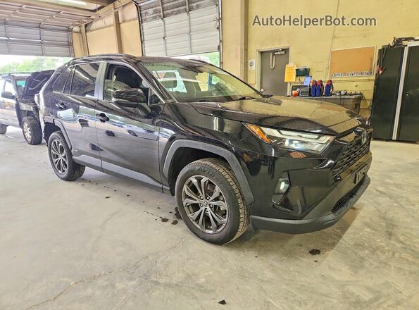 JTMB6RFV9PD087012 2023 TOYOTA RAV4 Черный Передняя правая четверть