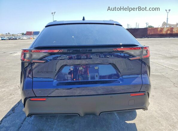 JTMBEAGC8TJ001122 2026 SUBARU SOLTERRA Blue Rear view
