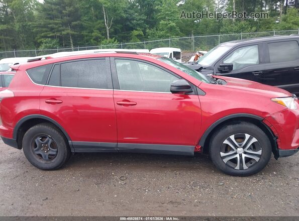 JTMBFREV0HJ126185 2017 TOYOTA RAV4 Red Vista interior trasera