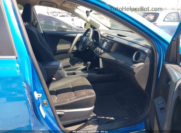 JTMBFREV0HJ702115 2017 TOYOTA RAV4 Blue Vista interior delantera