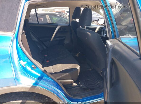 JTMBFREV0HJ702115 2017 TOYOTA RAV4 Blue Vista de la etiqueta del VIN