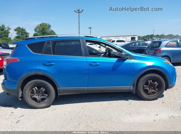 JTMBFREV0HJ702115 2017 TOYOTA RAV4 Blue Vista interior trasera