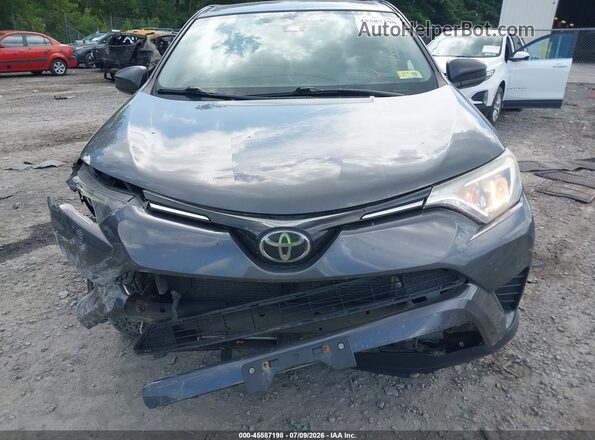 JTMBFREV0JJ200355 2018 TOYOTA RAV4 Gray Դիմացի տեսք