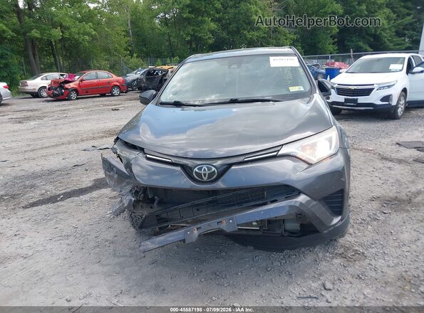 JTMBFREV0JJ200355 2018 TOYOTA RAV4 Gray Սարքավորումների վահանակի տեսք