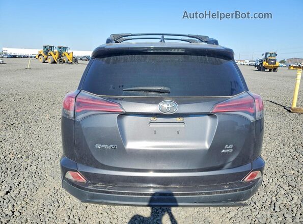 JTMBFREV0JJ240676 2018 TOYOTA RAV4 Серый Вид сзади