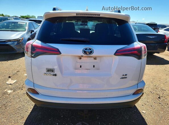 JTMBFREV1GJ094779 2016 TOYOTA RAV4 White Հետևի տեսք
