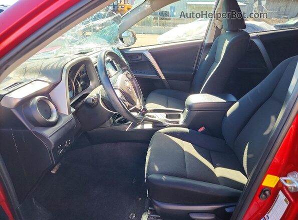 JTMBFREV2GJ087095 2016 TOYOTA RAV4 Red Widok wnętrza z przodu