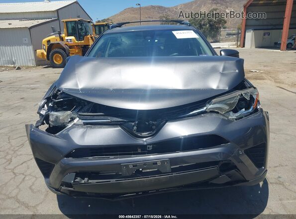 JTMBFREV2HJ131680 2017 TOYOTA RAV4 Gray Вид задньої частини салону