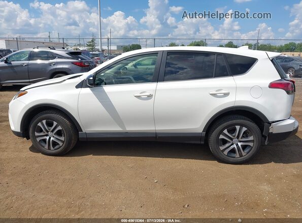 JTMBFREV2HJ161987 2017 TOYOTA RAV4 White Вид задньої частини салону