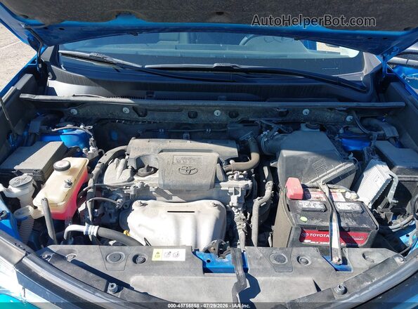 JTMBFREV2HJ702925 2017 TOYOTA RAV4 Blue Rear view