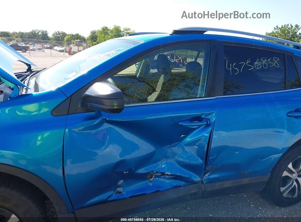 JTMBFREV2HJ702925 2017 TOYOTA RAV4 Blue Front view