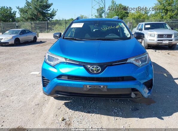 JTMBFREV2HJ702925 2017 TOYOTA RAV4 Blue Instrument cluster view