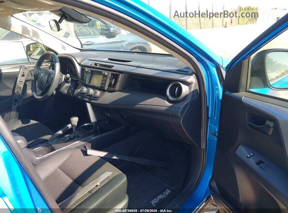 JTMBFREV2HJ702925 2017 TOYOTA RAV4 Blue Front interior view