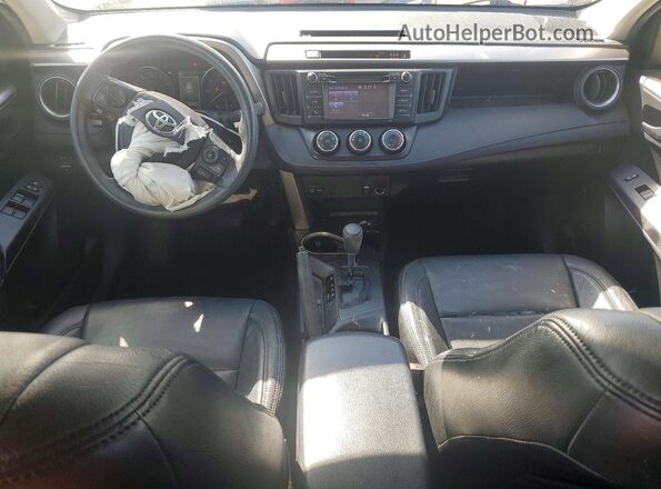 JTMBFREV2JJ208179 2018 TOYOTA RAV4 Белый Вид панели приборов