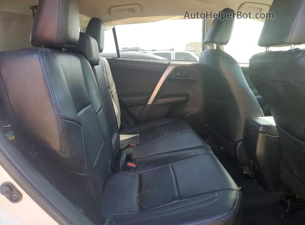 JTMBFREV2JJ208179 2018 TOYOTA RAV4 Белый Вид задней части салона