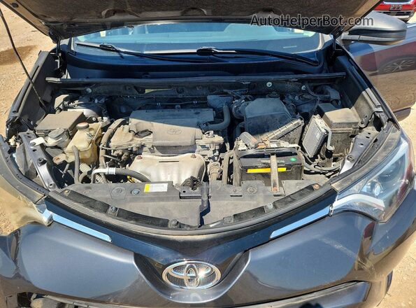 JTMBFREV3GD182022 2016 TOYOTA RAV4 Gray Vista interior trasera