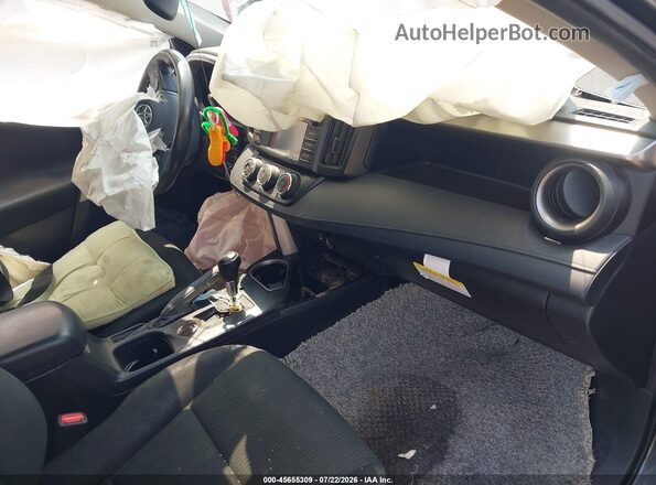 JTMBFREV3HJ119084 2017 TOYOTA RAV4 Gray Front interior view