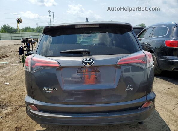 JTMBFREV3JJ216517 2018 TOYOTA RAV4 Серый Вид сзади