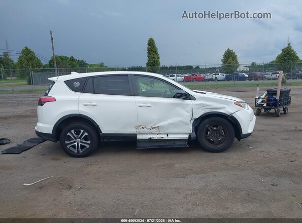 JTMBFREV3JJ246729 2018 TOYOTA RAV4 White უკანა სალონის ხედი