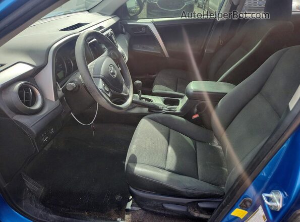 JTMBFREV4GJ091259 2016 TOYOTA RAV4 Blue Front interior view