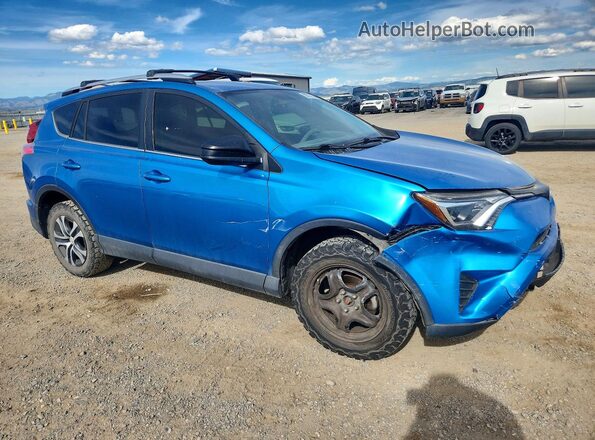 JTMBFREV4GJ091259 2016 TOYOTA RAV4 Blue Front right