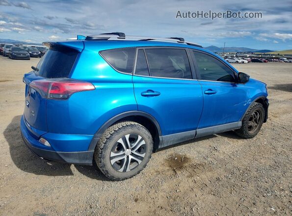 JTMBFREV4GJ091259 2016 TOYOTA RAV4 Blue Rear right