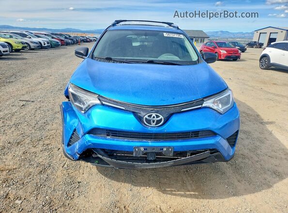 JTMBFREV4GJ091259 2016 TOYOTA RAV4 Blue Front view