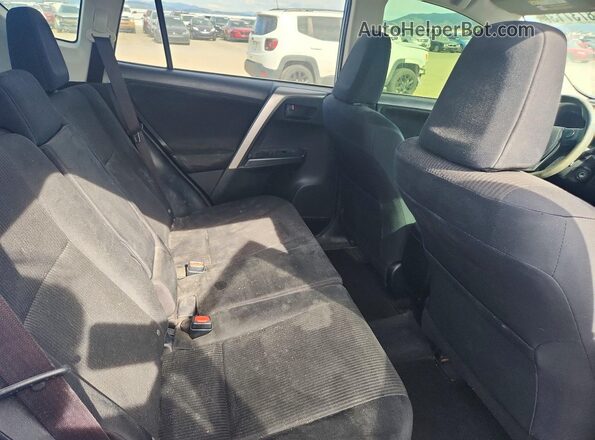 JTMBFREV4GJ091259 2016 TOYOTA RAV4 Blue Rear seats view