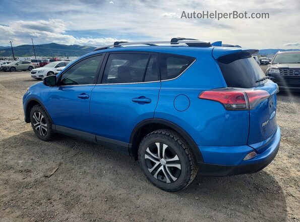 JTMBFREV4GJ091259 2016 TOYOTA RAV4 Blue Rear left