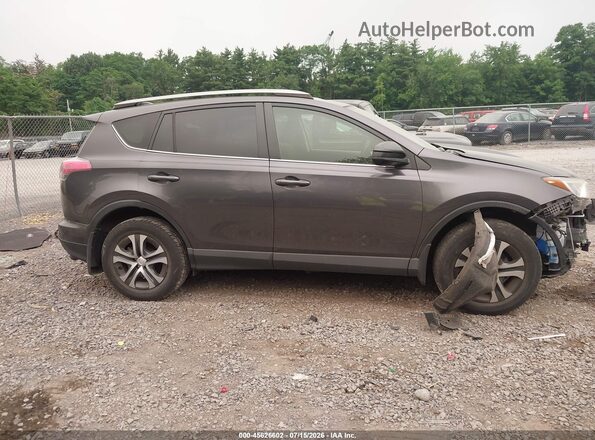 JTMBFREV4HJ131034 2017 TOYOTA RAV4 Black Вид задньої частини салону