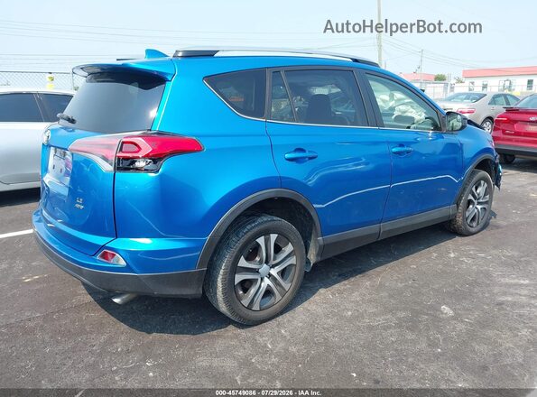JTMBFREV4HJ131809 2017 TOYOTA RAV4 Blue Tył prawy