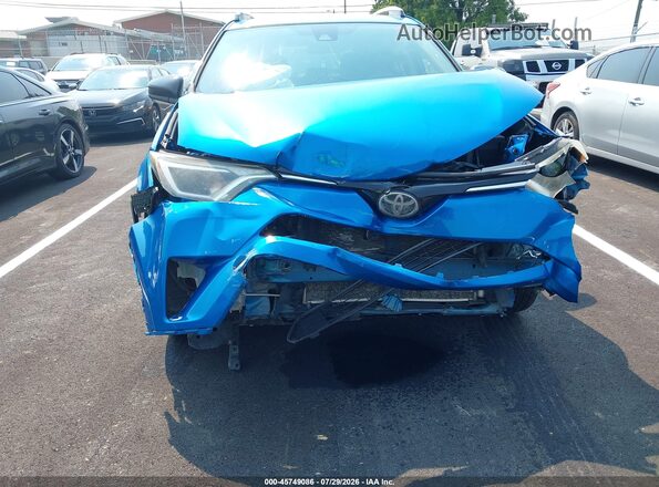 JTMBFREV4HJ131809 2017 TOYOTA RAV4 Blue Widok z przodu