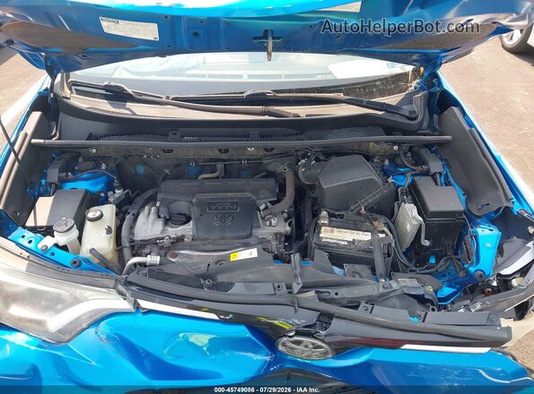 JTMBFREV4HJ131809 2017 TOYOTA RAV4 Blue Widok z tyłu