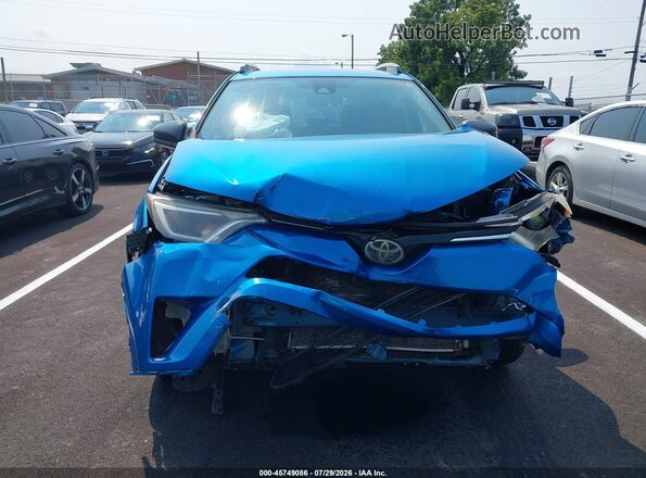 JTMBFREV4HJ131809 2017 TOYOTA RAV4 Blue Widok wnętrza z tyłu