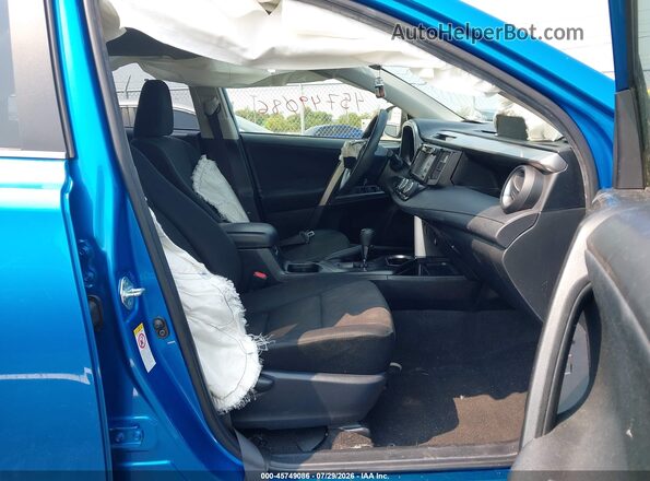 JTMBFREV4HJ131809 2017 TOYOTA RAV4 Blue Widok wnętrza z przodu