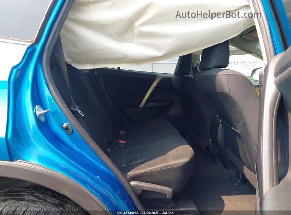 JTMBFREV4HJ131809 2017 TOYOTA RAV4 Blue Widok naklejki z numerem VIN
