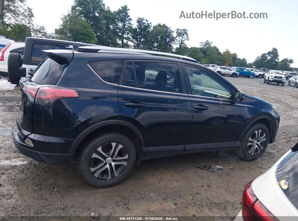 JTMBFREV4HJ710489 2017 TOYOTA RAV4 Blue Rear interior view
