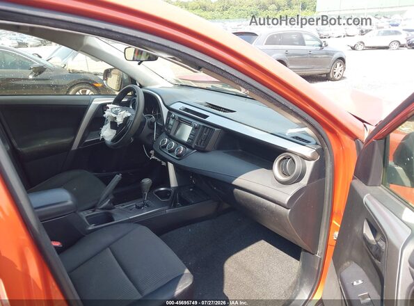 JTMBFREV5GD196679 2016 TOYOTA RAV4 Оранжевый Вид салона спереди