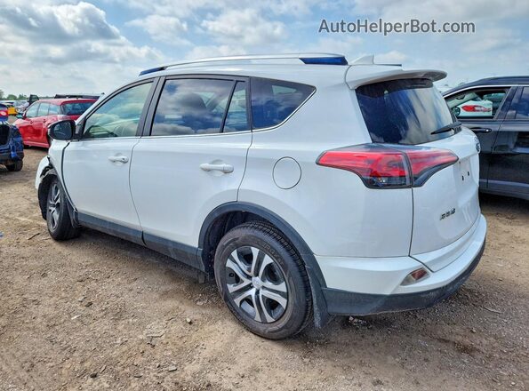 JTMBFREV5GJ058092 2016 TOYOTA RAV4 White Tył lewy