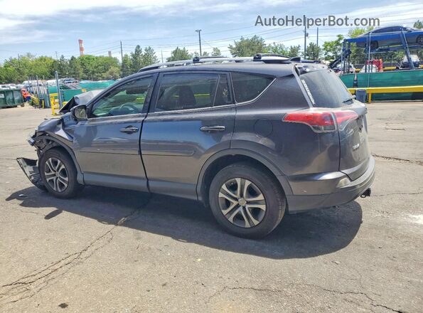 JTMBFREV5HJ709609 2017 TOYOTA RAV4 Gray Rear left
