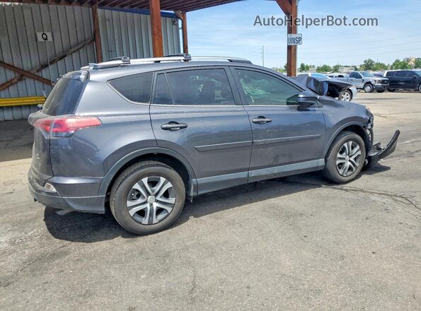 JTMBFREV5HJ709609 2017 TOYOTA RAV4 Gray Rear right