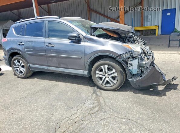 JTMBFREV5HJ709609 2017 TOYOTA RAV4 Gray Front right