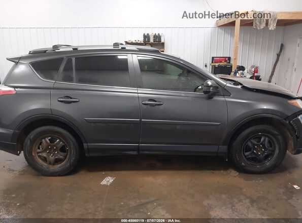 JTMBFREV5HJ711635 2017 TOYOTA RAV4 Gray Вид задньої частини салону