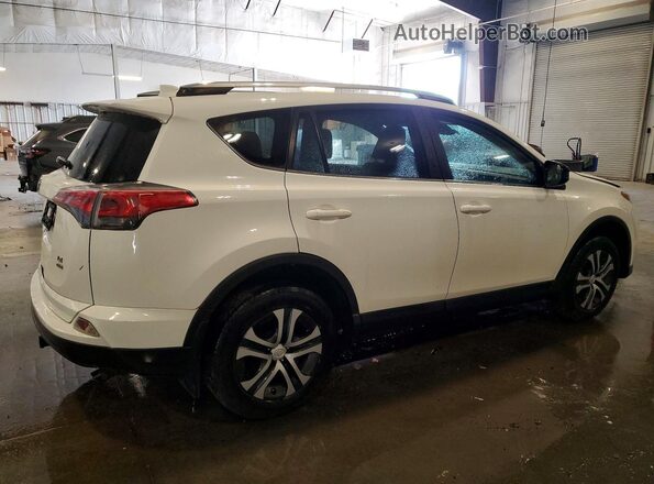 JTMBFREV6JJ186834 2018 TOYOTA RAV4 White Rear right
