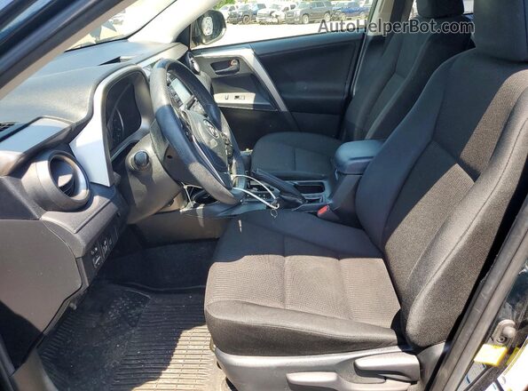 JTMBFREV6JJ208606 2018 TOYOTA RAV4 Black Vista interior delantera
