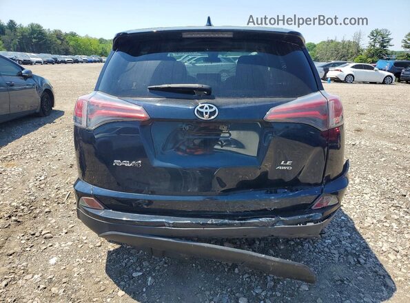 JTMBFREV6JJ208606 2018 TOYOTA RAV4 Black Vista trasera