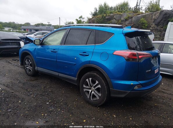 JTMBFREV6JJ215068 2018 TOYOTA RAV4 Blue Rear left